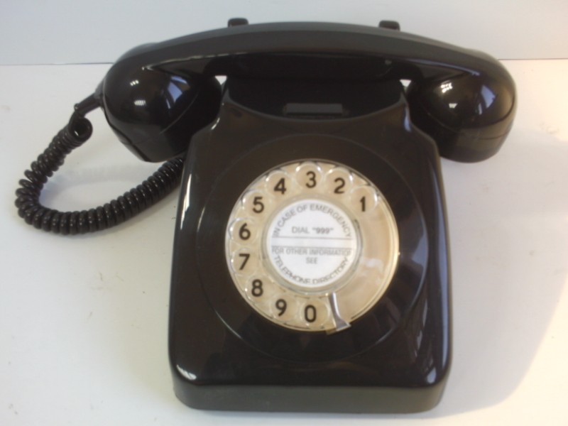 Retro plastic dial phone; new black body